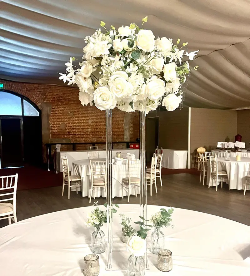 Large ivory centrepiece on acrylic stand
