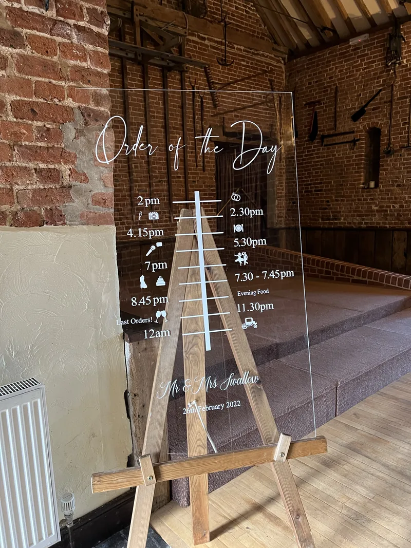 Personalised acrylic order of the day on a wooden easel